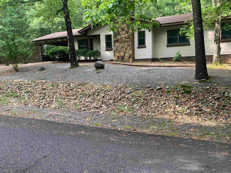 If you want a home is a private location, level corner lot, this could be the one!  This home is single level, has 3 bedrooms, 2 bathrooms, single carport, screened porch and a very spacious closet in guest bedroom.  New roof by Keith's Roofing and new vinyl flooring throughout. Driveway extends to side street and front street. No disclosure available.  Owner did not occupy the house.  Please allow 3-5 days for response to offer. Request pre-qualification letter with financing and proof of funds with cash offers. POA buy-in fee is $2,000.