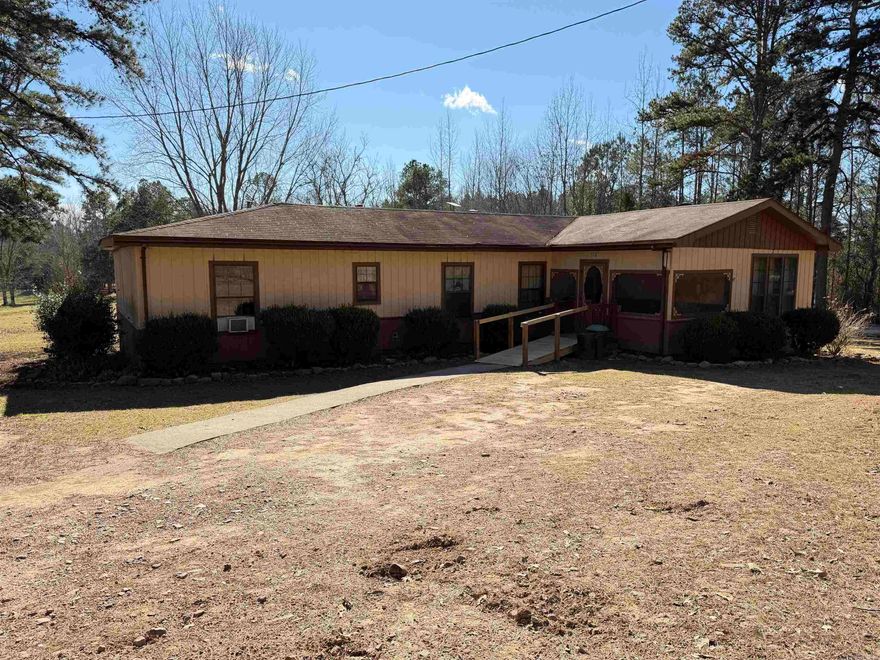 Located at 516 Polk Road 40 in Hatfield, Arkansas, this property offers a 2-bedroom mobile home with 1 full bath and 1 half bath situated on approximately 2 acres of land. The home features a kitchen, laundry room, and a formal dining area. A screened porch offers an additional area to enjoy the outdoor setting. The property includes two outbuildings, offering flexibility for storage, hobbies, or workspace. This property presents a combination of indoor living space and outdoor land in a rural setting.