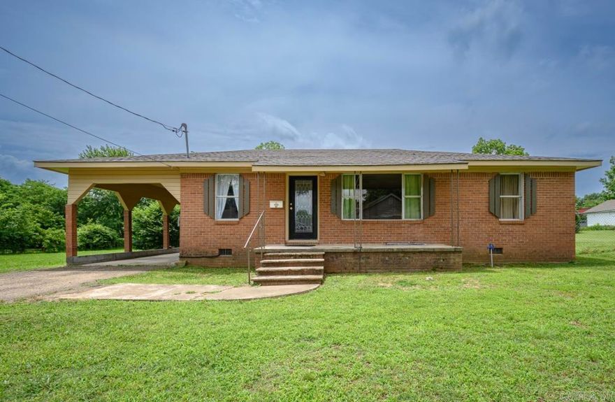 Updated home! New roof 8-2025,  new central heat & air unit currently being installed. Spacious living area with large picture windows offering natural lighting. Eat in Kitchen with many cabinets for storage. Three nice sized bedrooms. Laundry room with storage space. Carport, large fenced in back yard for your pets or children to play with garden area. Call for additional information and showing appointment.