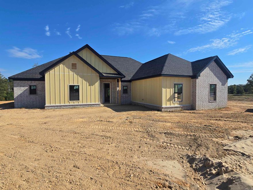 Fall in love with 4024 Creek Top in the lovely Plantation Hills neighborhood! This 4-bed, 3 bath beauty on 1.01 acres offers 2238 sq ft of modern comfort and charm. Striking Hardie board and brick exterior, beautiful luxury vinyl floors, and an open-concept layout with a wood-burning fireplace (easy gas log starter!) make entertaining a breeze. Upgraded hardware throughout adds lovely details, and foam insultation is an added bonus for comfort and efficiency. The oversized pantry is a chef's dream, and spacious bedrooms offer room for everyone. The split floor plan gives privacy to the master suite with a freestanding tub and walk-in shower, while the guest bath features a tiled shower/tub combo for an upgraded feel. This home won't last long. Schedule a showing! This could be your forever home. Estimated completion Nov. 2025. Professional pictures to come.