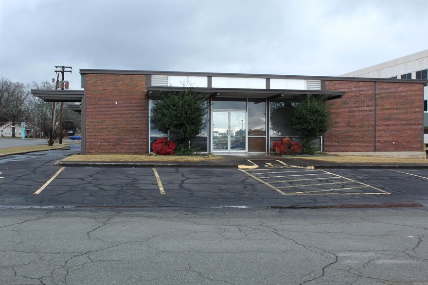 Great building ready for your Business.  All Cinder Block construction, with drive thru window.  Lots of extra electrical outlets including several 220.  Awesome location right across from library on Main St. Seller will Lease, call for more information.  As Is Where Is Buyer to Inspect.