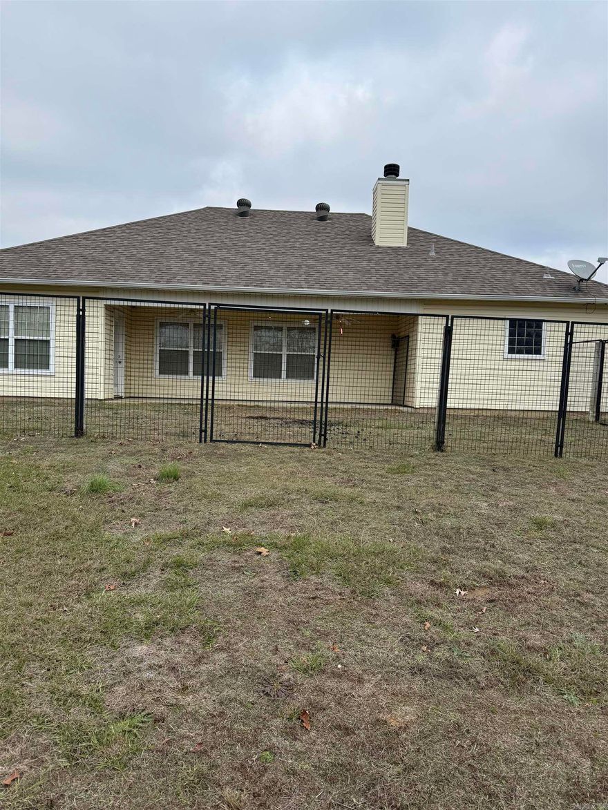 This home sits on just over an acre in the Bauxite School District and offers 3 bedrooms, 2 full bathrooms, and just over 1,700 sq. ft. of living space.  Pets are allowed with some restrictions, and the back patio is set up for pets. A refrigerator is provided, along with access to a freezer in the garage.  Additional features include a two-car garage with a storm shelter, washer and dryer hookups, and ample outdoor space for privacy and enjoyment.