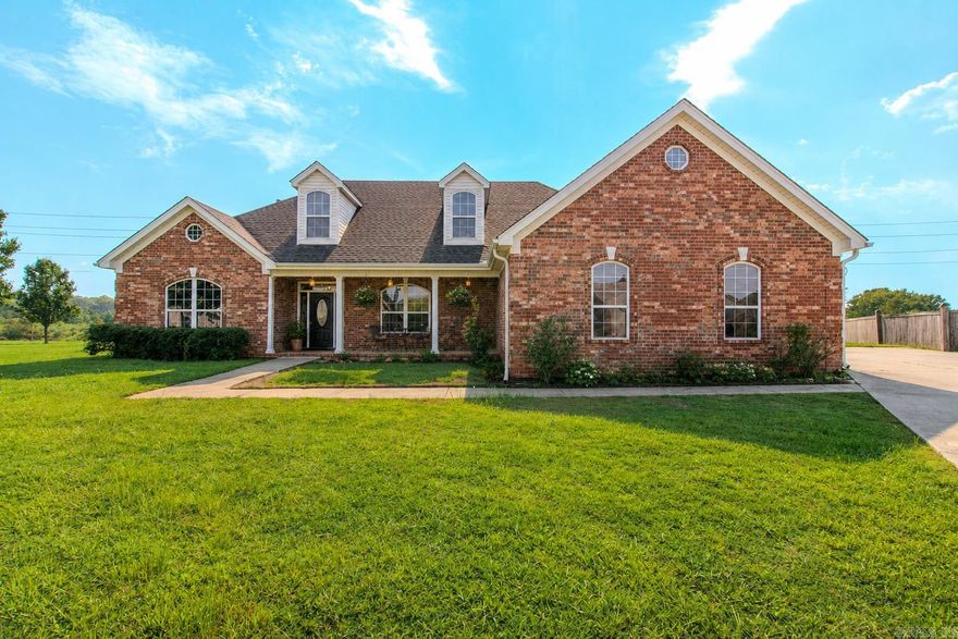Welcome to this wonderful, multigenerational home with three car garage, on the lake! Two homes in one and handicap accessible, has so much to offer! Main floor has three bedrooms, two baths, two living areas, both with fireplaces, formal dining room, chefs kitchen with huge island, gas range, refrigerator, lots of custom wood cabinets, desk area, two microwaves and walk-in pantry! Also has heated/cooled sunroom with great view of the lake, so peaceful! The second floor has full kitchen, dining/living area, bathroom, bedroom and a huge bonus room and the best part, a private entrance! Two tankless water heaters, newer roof and generator! Some photos are virtually staged.
