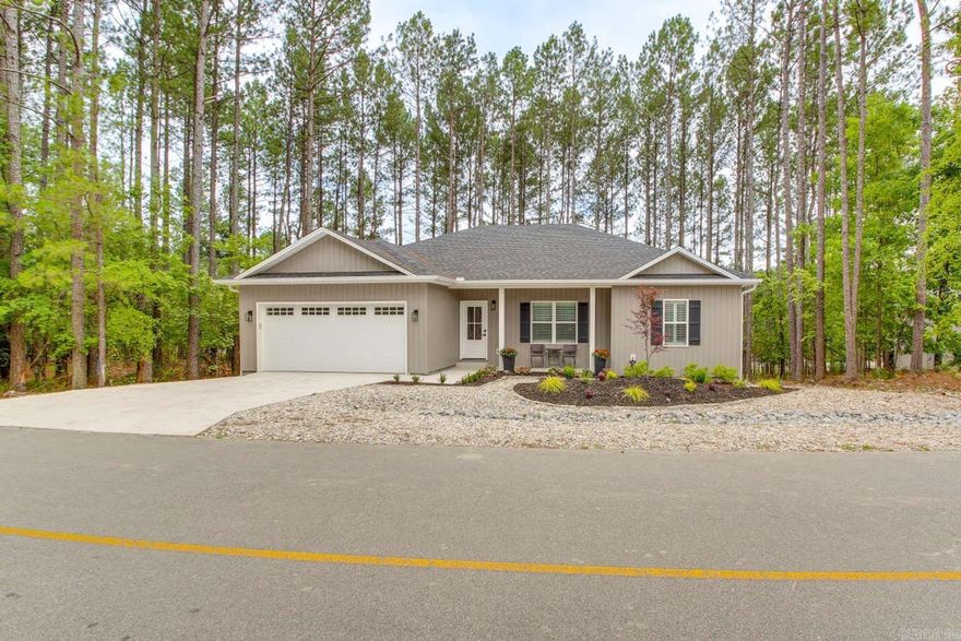 Location, Location, Location! Short walk to Granada Golf Course, club house and restaurant and priced right.  Newly built in 2024, 3 Bedrooms (divided); large deck (very private); Open floor plan; Everything you need & like in a new house; upgraded finishes and appliances, back lit mirrors in both bathrooms, and low maintenance yard. Crawlspace has been completely encapsulated, and a professionally installed dehumidifier was also added to keep crawlspace nice and dry for peace of mind. Level driveway; Lovely primary residence; part time retreat; or enviable rental. Did I say, "PRICED RIGHT"!?   SEE AGENT REMARKS