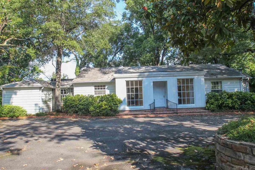 Charming home, needs some updating.  Amazing Gardens and private lot.  3.3 acres adjoins east side of Country Club of Little Rock.  Really special property.