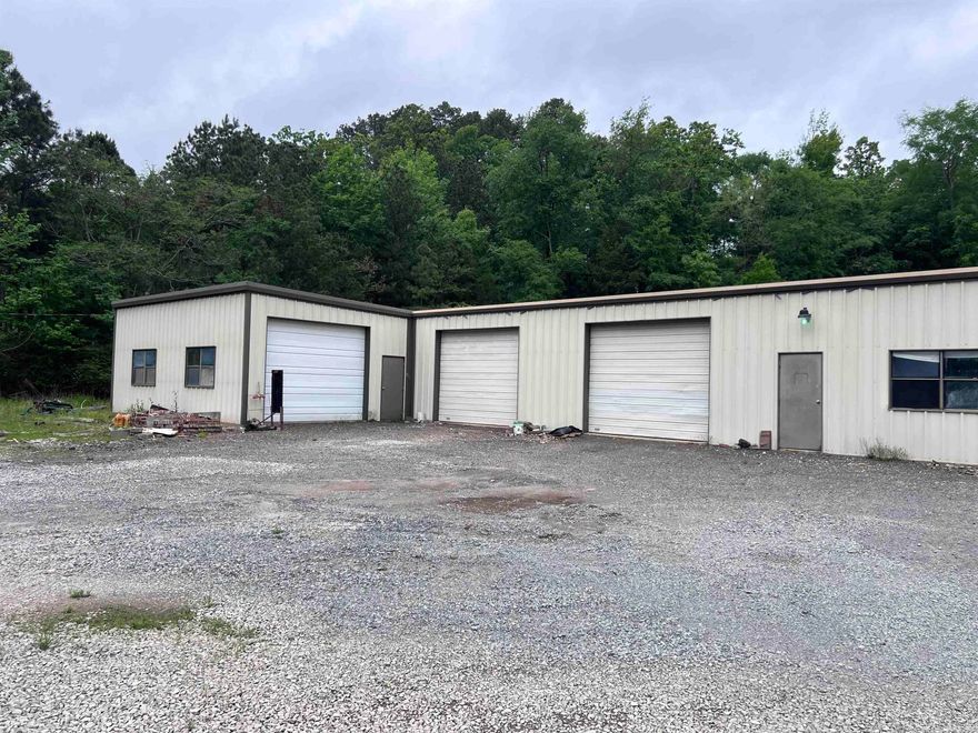 Prime commercial opportunity! This 5,100 sq ft warehouse sits on over an acre of level, usable land in a highly visible location with excellent accessibility. The property offers ample parking and flexible space ideal for retail, restaurant use, distribution, light industrial, or a variety of other business ventures.  With strong road frontage and high traffic exposure, this property provides the visibility and functionality businesses need to thrive. Whether you're expanding, relocating, or investing — this versatile space is ready for your vision.