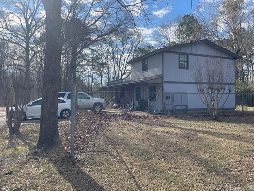 Investor opportunity on a full 1.00-acre lot in Pulaski County. This single-family home offers approximately 2,240 square feet of living space and is situated in a quiet, rural setting with room to add value. The property features two full bathrooms, an open front porch, fireplace, central heat and air, chain-link fencing, and a utility outbuilding. With its acreage, size, and layout, this property presents strong potential for renovation, rental, or resale. Property is being sold AS-IS, with no repairs or warranties provided by the seller. Buyer to perform all due diligence prior to closing. Cash or hard money preferred. Listing is subject to an existing contractual interest.