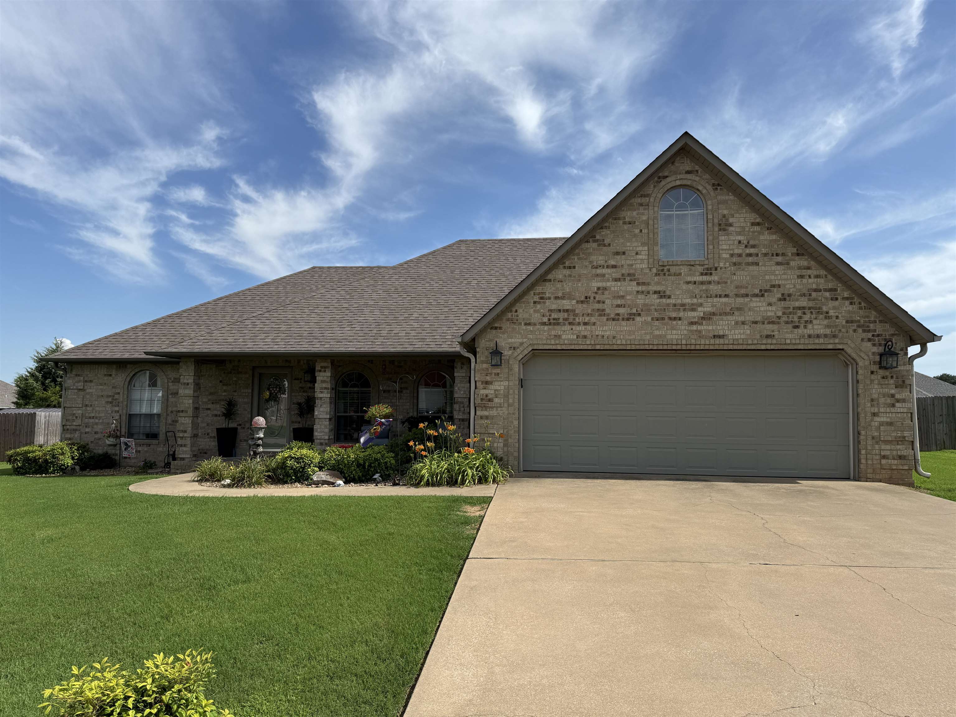 Welcome to this well-maintained 3-bedroom, 2-bath home in the desirable Carriage Hills subdivision! This property offers the perfect blend of comfort and convenience, featuring a spacious split floor plan, generous living areas, and a large kitchen ideal for hosting or everyday living. The primary suite includes a walk-in closet and private bath for your own retreat. Outside, you'll find a beautifully landscaped yard and a 16x20 outbuildingāperfect for a workshop, storage, or hobby space. Located on a quiet street with easy access to local schools, shopping, and dining, this home has everything you need and more. Donāt miss your chance to see it!