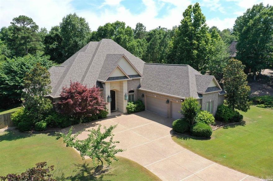 Red Oak Ridge is a gated community in Hot Springs, Arkansas, covering approximately 800 acres. It offers a perfect blend of nature and neighborhood living. with two private lakes and jogging trails throughout.  This home boasts four bedrooms, three and a half baths for your convenience. Enjoy a bonus room over the garage, perfect for additional living space or entertainment. Work from home in a dedicated private study or office.  The property features a fenced yard, providing privacy and security. The kitchen boasts quartz counters and top-of-the-line appliances. This level lot offers serenity and seclusion, allowing you to escape the hustle and bustle.  New roof in 2023, both HVAC units replaced 2024!
