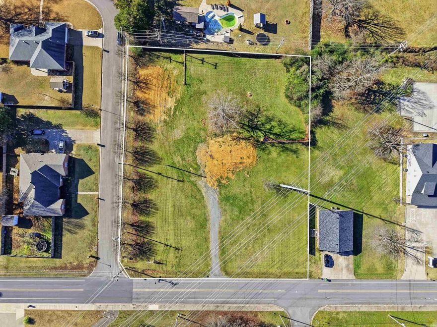 Nestled in a quiet residential pocket of west Conway, this 1.52± acre lot offers a rare dual opportunity: build your custom dream home on a spacious, utility-ready site or step into a nearly shovel-ready 6-townhome project with plans already well underway with the City of Conway. All city utilities are present except sewer, and R-1 zoning plus convenient access to Conway schools, shopping, and dining make this an ideal spot for both homeowners and savvy builders. Whether you are looking for elbow room and privacy or a strong multi-unit investment play, 377 Reedy Rd is poised for your next move.