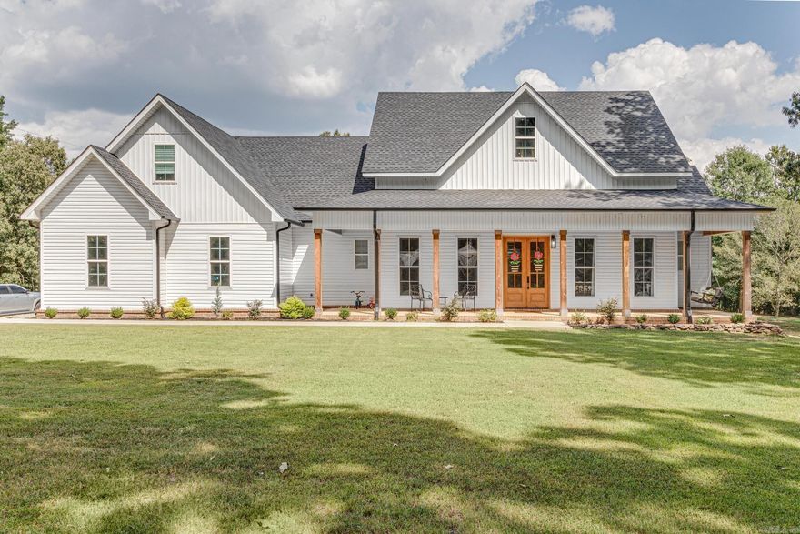 Dreaming of your own getaway right outside of town? Check this one out! Situated on 8.63 +/- acres in the Valley View School District, this home was built in 2021. Adorned with porches and wooden columns, this home will instantly feel like a retreat. Most of the living space in on the lower level. Enter the double front doors into the open living room, dining room and kitchen. The living room holds a gorgeous floor-to-ceiling brick fireplace and vaulted ceilings. An abundance of cabinets, walk-in pantry, island, granite countertops, backsplash, stainless steel appliances and gas stove complete this modern kitchen. Enjoy the split floor plan with two spare bedrooms adjoined with a Jack & Jill bathroom complete with a tiled tub surround & quartz countertops. Spare bedrooms have tall ceilings and walk-in closets. On the other side of the home is an oversized laundry room, half bath and the primary suite. This bathroom will make you want to stay forever! Soaker tub, tiled shower, quartz countertops & a massive walk-in closet finish the suite. This home also has a large fourth bedroom or closet upstairs. 8 ft. doors throughout. A 24x30 shop makes this property a great fit for everyone!