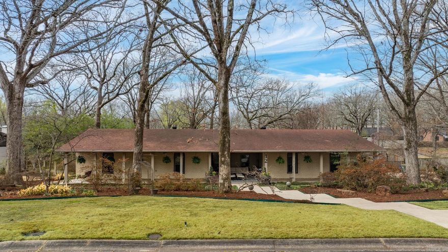 Welcome to 12 Edenwood Lane in North Little Rock — a home with history, charm, and exceptional functionality. Originally featured in the 1960s Parade of Homes, this property showcases thoughtful design and timeless character. This 3 bedroom, 2.5 bath home offers spacious living areas, updated bathrooms, and an updated kitchen ready for everyday living and entertaining. The primary suite features two walk-in closets, while abundant storage can be found throughout the home, including a large walk-in pantry.  Enjoy the beautifully maintained yard designed by a master gardener, complete with a sprinkler system. Relax on the inviting front porch, unwind on the covered back porch, or enjoy the sunroom with hot tub overlooking the landscaped backyard. A 2-car garage provides additional storage and convenience.  With its unique history, beautiful landscaping, and generous storage, this home offers a rare opportunity on a culdesac in a charming North Little Rock neighborhood.