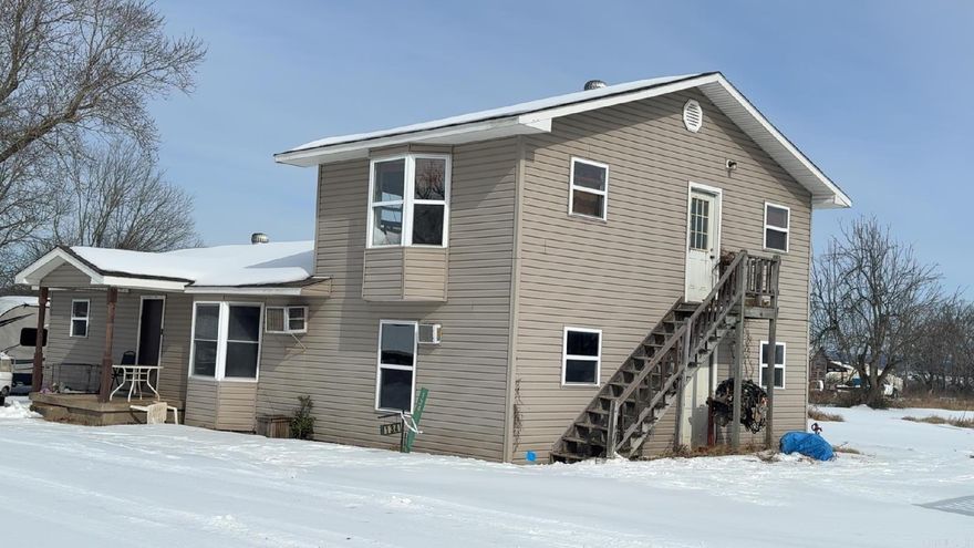 Great opportunity to own a 4-bedroom, 2-bath home situated on a level 0.80-acre lot, offering room to spread out and enjoy the setting. With approximately 1,728 sq ft, the home features an open floor plan on the main level with three bedrooms, one full bathroom, and a separate laundry room—including a main-level primary bedroom. In addition, the home offers a second primary suite upstairs, providing exceptional flexibility. The upstairs primary suite features a bay window with mountain views, a private bathroom, and a separate exterior entrance with its own staircase, making it ideal for additional living quarters, guests, or private quarters. The home is being sold furnished and includes a two-car garage. The level acreage offers ample space for parking, storage, or future improvements. Located near Ouachita River access, float areas, and ATV trails throughout the Ouachita National Forest. Bring your kayaks, ATVs, trailers, and more—this location is perfect for outdoor recreation. Approximately 30 minutes to Mena and about one hour to Hot Springs. Agents, please see remarks.