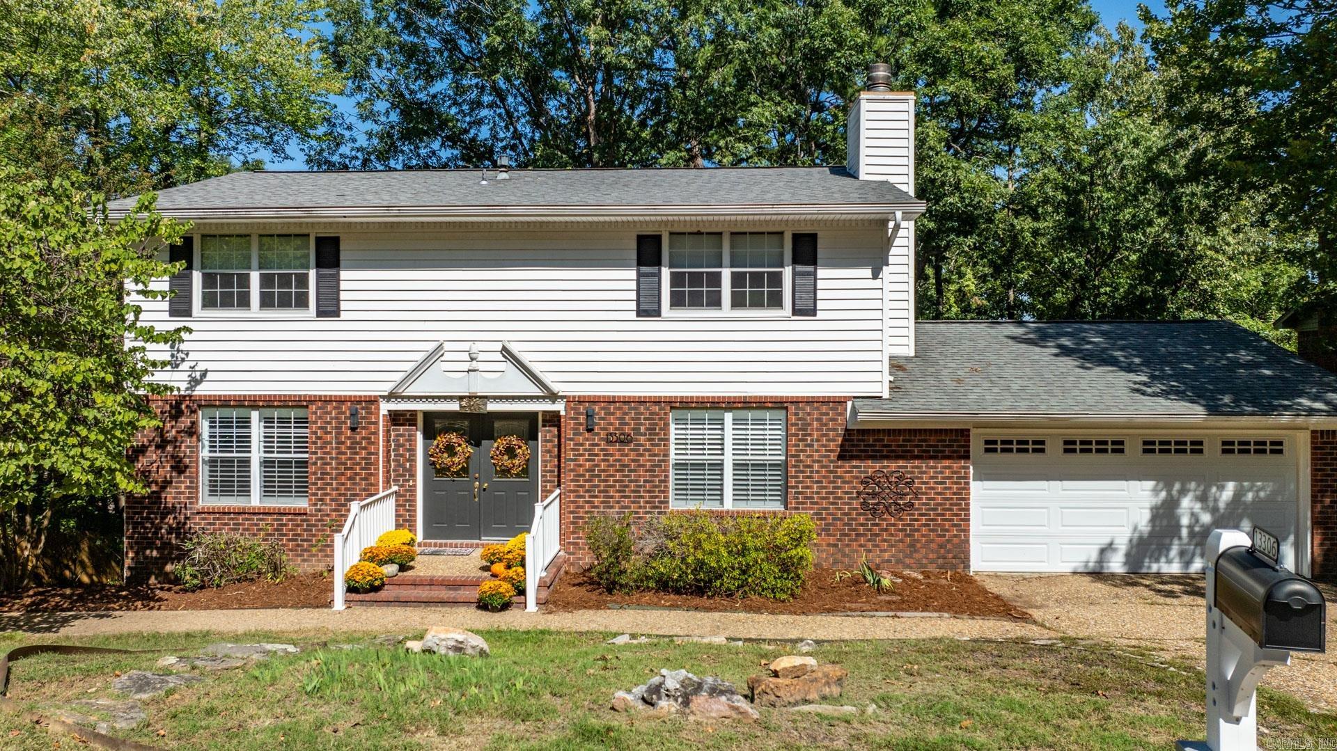 Traditional 2 Story home PLUS a finished-out basement/playroom offers room for everyone in a private setting with trees galore! This home continues to be beautifully updated from fresh paint & LVP flooring, to new window coverings, replaced light fixtures, and more! Main level has a large den with a fireplace, an Extra-Large Dining room for entertaining and games, an optional home office area, and an updated eat-in Kitchen with granite countertops! All 4 bedrooms are upstairs and have been updated with paint & carpet. Spacious primary suite with modernized bath and shower. Downstairs is a dream for kid's or adult's with a large area to lounge in & watch TV or movies, play ping pong (or get a pool table!), hang out with friends, and order 'door dash' from Mom upstairs! LOL! Backyard is big, beautiful, lots of trees, and room to roam! Kids have their own "cabin" to play in and yard has a new fenced area for the pups! Don't forget the neighborhood pool & park, which are walking distance from the house. Convenient WLR location allows easy access to everything! See agent remarks.