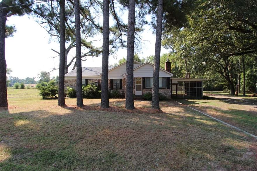 Great condition older home on 1.49 acres.  HVAC less than 1 year old, lots of storage and large screened porch.  Other features include a large Capprex 48x30 drive through shop with 10' double doors, detached 2 car garage and a barn.  Very convenient to Highway 65 and interstate.  Great location for home business.