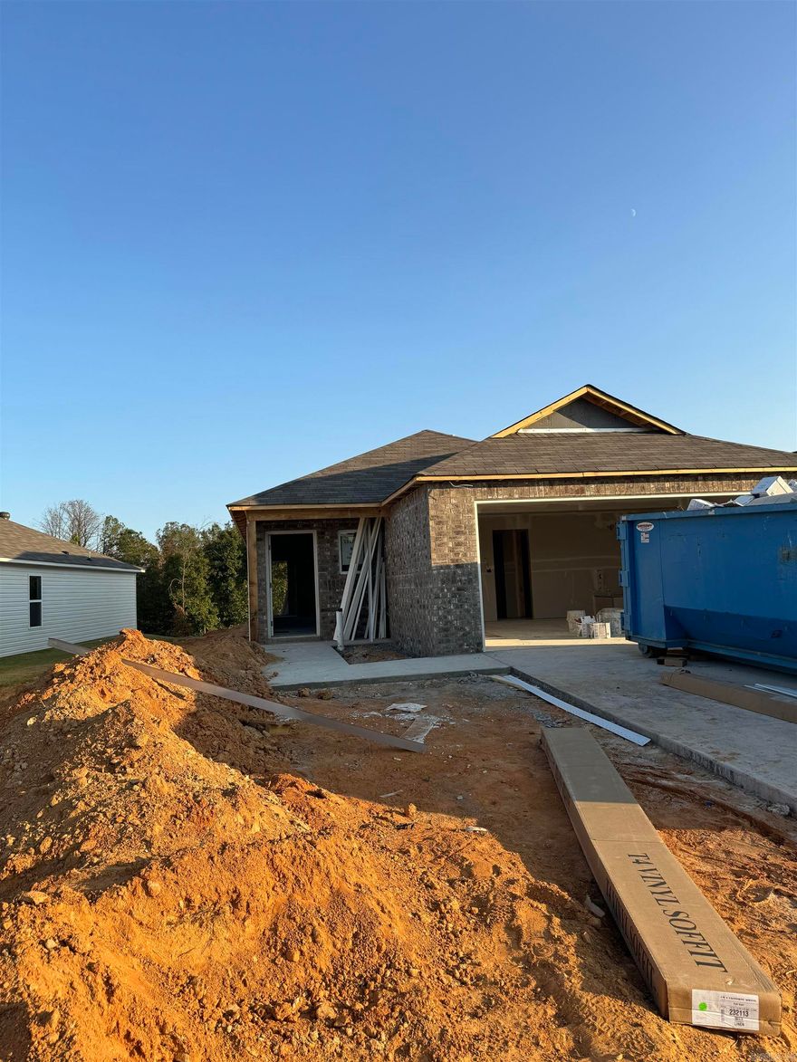 The Mitchell plan is a sleek, modern looking plan with an open concept Living Room that flows into an eat-in Kitchen. The back door opens onto a covered patio. Come tour it today!  Thoughtful upgrades included in this home: 60" fiberglass standup shower (no enclosure) in Master Bath, plumbing faucet upgrade 4, 8" deep Kitchen sink, pull out Kitchen faucet upgrade, gas fuel furnace, cabinet hardware level 1, 16" laminate bar top in Kitchen, Luxury Vinyl Plank flooring in wet areas and Living Room and adjacent hallways, raised ceilings in Living Areas per municipal requirements, fiberglass exterior doors, Cheyenne style doors, baseboards level 2, 25in wide attic stairs, level 1 ceiling fan in Living Room and Master Bedroom, full sod, microwave hood in Kitchen.        *** AGENTS, PLEASE SEE SHOWING REMARKS OR AGENT REMARKS FOR VERY IMPORTANT INFORMATION. ***  THIS HOME IS SCHEDULED TO BE COMPLETE IN EARLY DECEMBER.