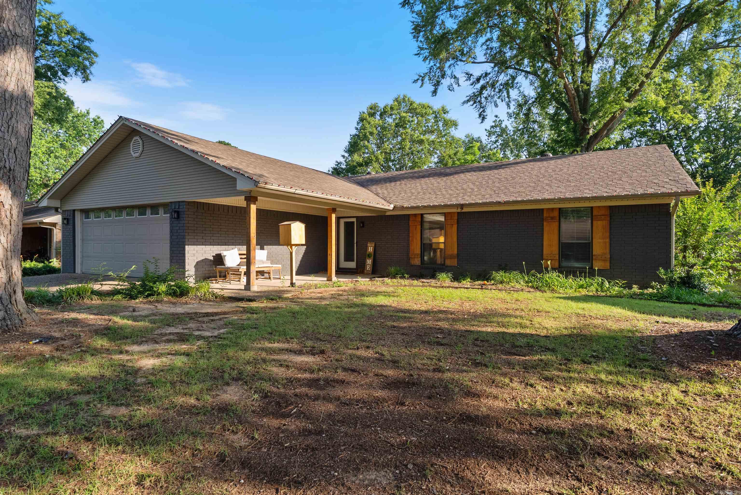 In the heart of Conway- steps from Tucker Creek Trail, This beautifully updated 4-Bedroom, 2,284 SQFT home blends modern upgrades with timeless charm. Featuring an additional primary suite with custom tile shower and designer vanity, plus a remodeled kitchen with new electrical, plumbing fixtures, and lighting throughout. Flexible living spaces offer room for a home office playroom or more enjoy curb appeal with painted brick, hand crafted Cypress shutters, and custom porch columns lots of storage and thoughtful details throughout.