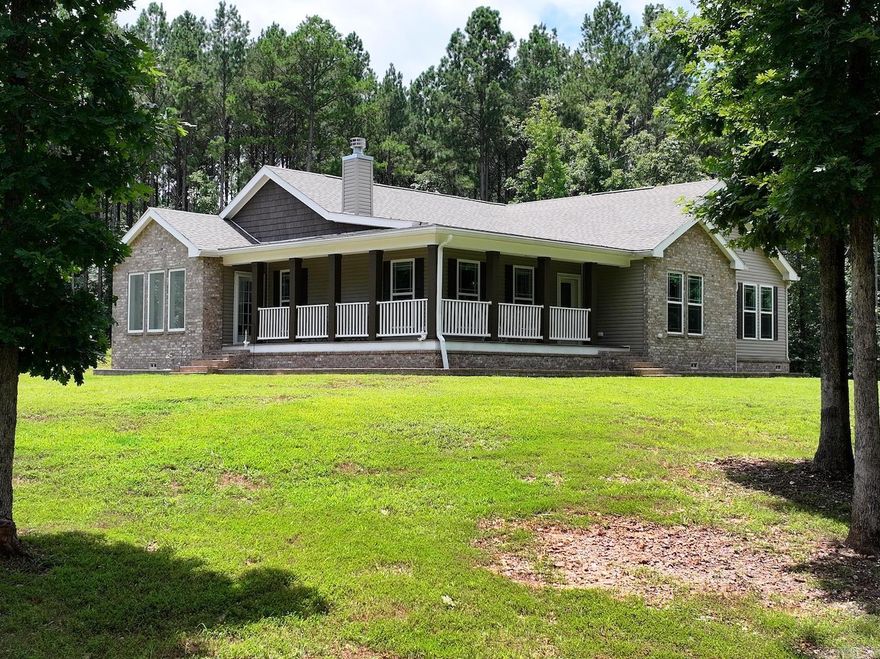 This 3-bedroom, 2-bathroom, 2,670 sq ft home is only 4 years old and is like new! It sits on 49.93 +/- acres offering a beautiful creek and natural beauty.  Featuring a 50 x 50 shop with a 20' ceiling, with 200 amp service,  an extra 20 foot slab with electric and water hook ups. Plenty of room to roam, hunt, dig for crystals, etc. This is a great property for investment or long term home. It has endless potential and is a must see!