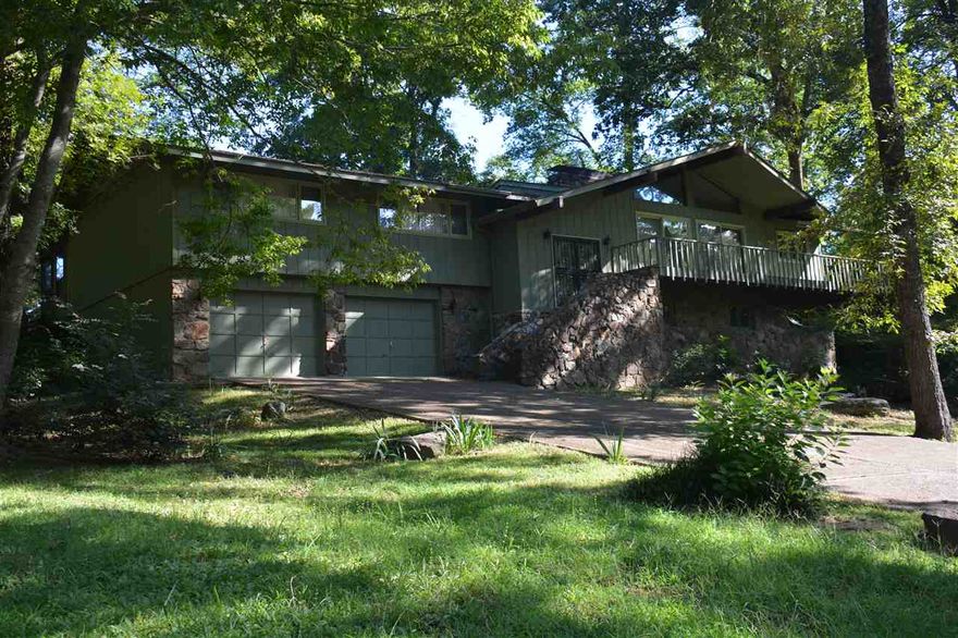 This is a beautiful one owner Custom built Golf Course front home on Eden Isle, just a short golf cart drive from the marina and Red Apple Inn. Custom kitchen cabinets. There is a fireplace in the living room and one in the dining room. Two Living areas and dining room upstairs, Vaulted ceiling in Main living area. wood windows, The downstairs has a full bath, game room/ family room with Fire place, inside hot tub,  There is a second 1 car garage for shop or and wheeled toys. Home needs some updating