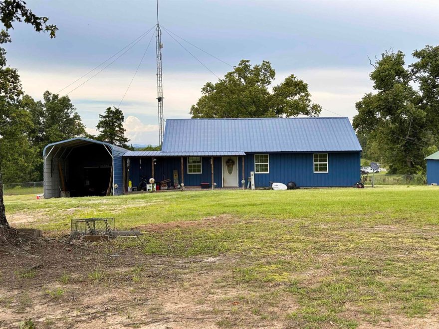 Beautiful two acers, completely fenced in with chain-link . Gorgeous shade trees. Quiet and peaceful out on Tucker Mountain.  Only twenty minutes out of Morrilton. Could be just the place you are looking for. Property was built in 2014, Yard is nice and spacious for someone who may like to garden. Also your pets would have plenty of room to run around. Property is being sold "AS  IS" seller will not make any repairs.
