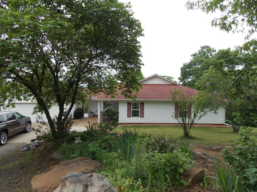 Private refuge with seasonal lake views, open floor plan, with 2 fireplaces, bonus room for den, office, or playroom, tall ceilings, lots of windows to enjoy the outdoor views, many improvements and upgrades, storm shelter, awesome screened outdoor porch sunroom area, dual hot water tanks w instant hot water, insulated shop. Walk in closets, walk in shower,  new stainless appliances, new hot water tanks, new hvac. Awesome fishing with public boat ramp... Be sure and check out this property.