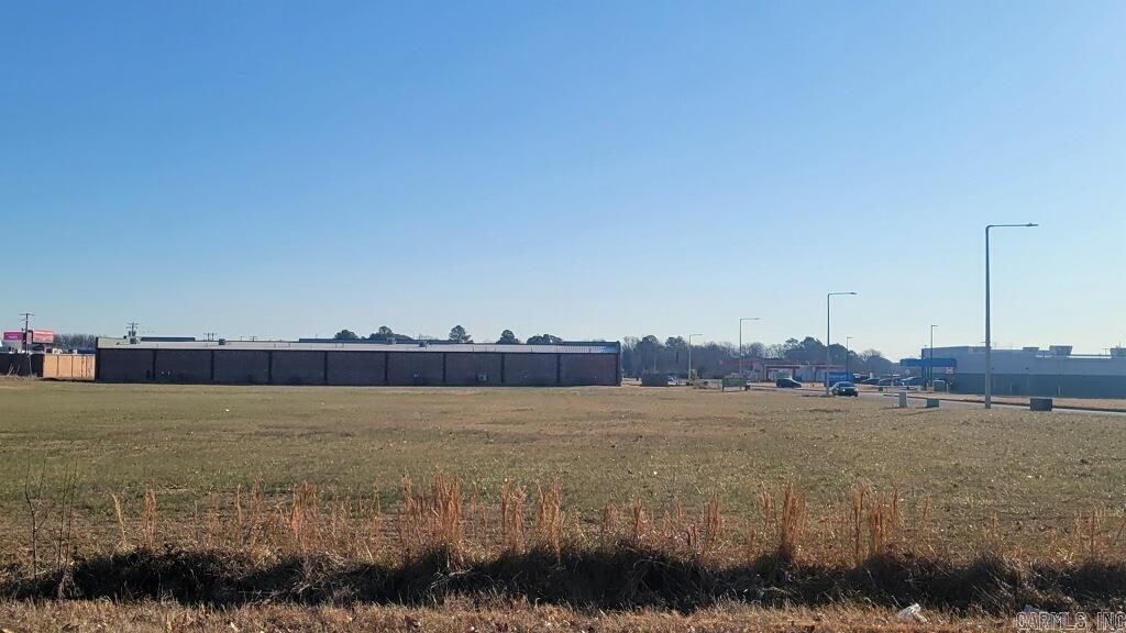Commercial land for development. Two lots for a combined 2.62 acres, corner lot. Located near Walmart Neighborhood Market, Buffalo Wild Wings, and other retail establishments.