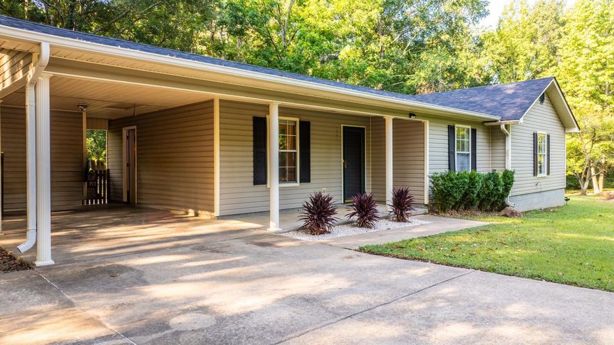 Welcome to this beautifully maintained 3-bedroom, 2-bath home, perfectly nestled on a serene one-acre lot. This property offers the best of both worlds: the tranquility of country living with the convenience of being just minutes from town. As you step inside, you'll be greeted by a warm and inviting living space that flows seamlessly throughout the home. The excellent condition reflects the care and attention to detail it has received over the years. Recent updates include a brand-new roof installed in 2023, ensuring peace of mind for years to come. The bedrooms are generously sized, providing ample space for relaxation, and the master suite features a private bath for your comfort. Step outside to discover your own private oasis. The expansive, secluded backyard is perfect for outdoor entertaining, gardening, or simply enjoying the peace and quiet of nature. With one acre of land, the possibilities are endless. For added safety, this property includes an underground storm shelter, providing security and peace of mind during stormy weather. Don't miss your chance to own this delightful home—schedule your showing today!