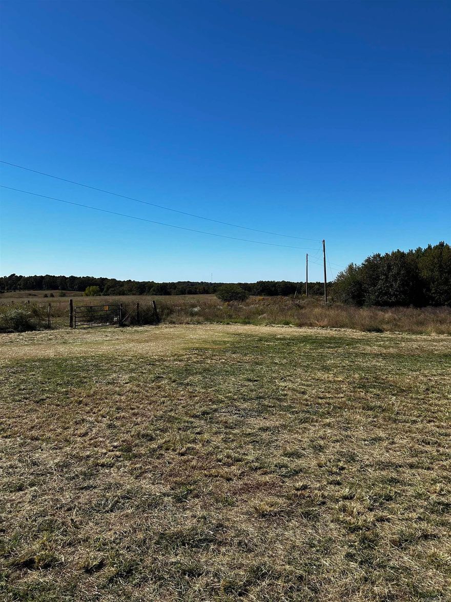 This is a very nice 3 acre lot that includes a 20x30 metal RV canopy. Property is gated and partially fenced.
