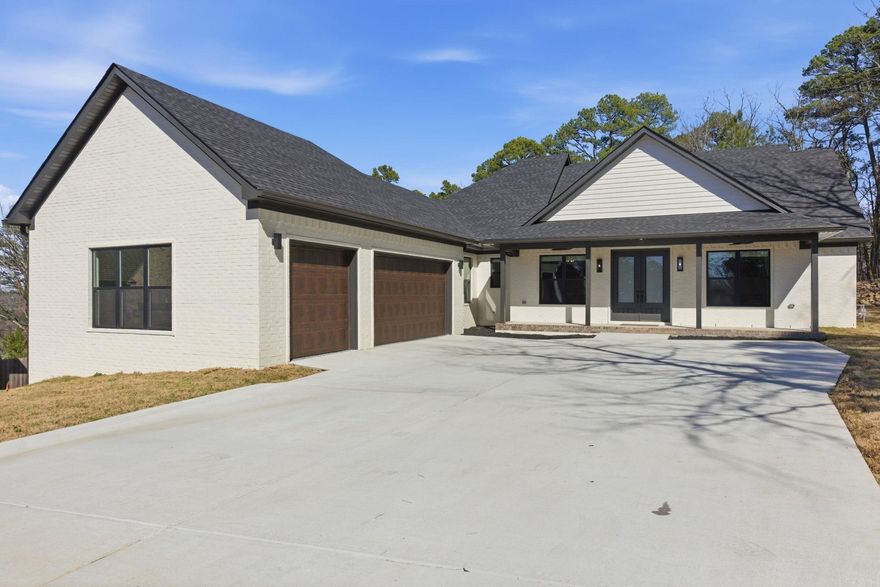 Welcome to this stunning new construction home located in the highly sought-after Majestic Pointe subdivision in beautiful Maumelle! Situated on a quiet cul-de-sac lot, this 4-bedroom, 2.5-bath home offers the perfect blend of modern design, functionality, and breathtaking natural surroundings.  Step inside to an open-concept floor plan filled with natural light and thoughtfully designed living spaces. The gourmet kitchen is a true showstopper, featuring high-end finishes, ample cabinetry, and a spacious walk-in Butler’s pantry—perfect for additional storage, prep space, and entertaining with ease.  The primary suite provides a private retreat with a spa-like ensuite bath, while the additional bedrooms offer flexibility for family, guests, or a home office. Every detail of this home reflects quality craftsmanship and contemporary style.  Enjoy peaceful evenings on the covered patio and stunning Pinnacle Mountain views, all while being conveniently located near parks, shopping, dining, and everything Maumelle has to offer.  Don’t miss your opportunity to own this beautiful home in one of Maumelle’s most desirable communities! Agents See Remarks