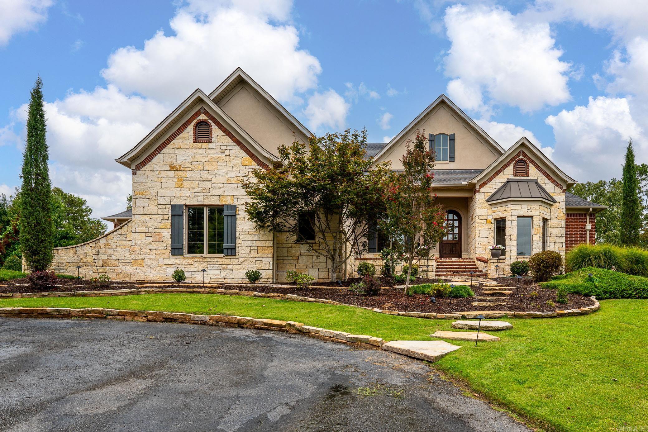 Gorgeous custom built home by Luke Porter on 2 acres with a fabulous view that overlooks Conway. This 4 bed/4 bath home has detailed molding, trim and gorgeous site finished wood floors along with Pella windows throughout the home. The split floor plan home features a spacious main suite w/beamed ceiling, large walk-in closet with 2 built-in dressers. The main level also includes 2 bedrooms with Jack & Jill bath,, office, formal dining room and media/study. the kitchen has granite countertops, cabinet panels on refrigerator and dishwasher along with a gas stove. Living has a newly built media cabinet and wood burning fireplace. Upstairs has a recreational room/workout room and a guest bedroom w/walk-out storage area. Home was painted in May 2023. This home is truly Exceptional. See "Agent Remarks"