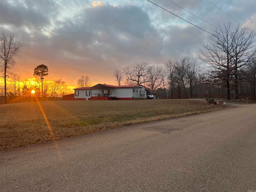 Welcome home to this well-maintained 3-bedroom, 2-bath property nestled on a spacious 0.60-acre lot. Enjoy peaceful country living with plenty of room to spread out, relax, and take in the beautiful Arkansas sunsets right from your front yard.  Located just minutes from Parker Creek, the Little Missouri River, Swaha, and Crater of Diamonds State Park, this property is perfectly situated for boating, fishing, swimming, hiking, and diamond hunting adventures. For side-by-side and ATV enthusiasts, you’ll love the easy access to miles and miles of scenic trails ready to explore.  Whether you’re looking for the perfect place for your family adventures or seeking a property with excellent Airbnb potential, this home offers flexibility, comfort, and an unbeatable location near some of the area’s most popular outdoor destinations.  Don’t miss your chance to own a slice of country living with endless recreation right at your doorstep!