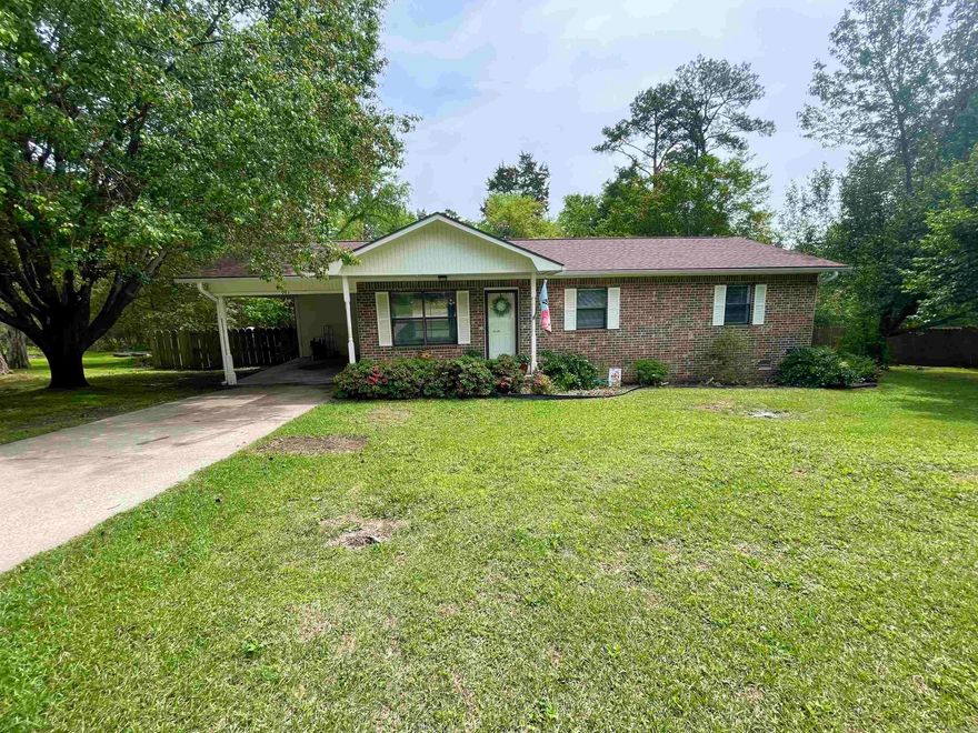 MOVE IN READY!!! A charming three-bedroom, two bathroom home boasting all-brick construction with recently added gutters, mature landscaping, and beautiful curb appeal. Step inside to discover new lighting, updated flooring, and neutral paint throughout. This home has great storage with an oversized laundry room, extra closets, and a pantry. Entertain effortlessly on the spacious covered deck, wile a convenient storage shed and wood privacy fence offer both practicality and seclusion! Nestled in a prime location, enjoy easy access to schools, restaurants, and shopping making daily life a breeze. This property is primed to welcome you HOME!!!