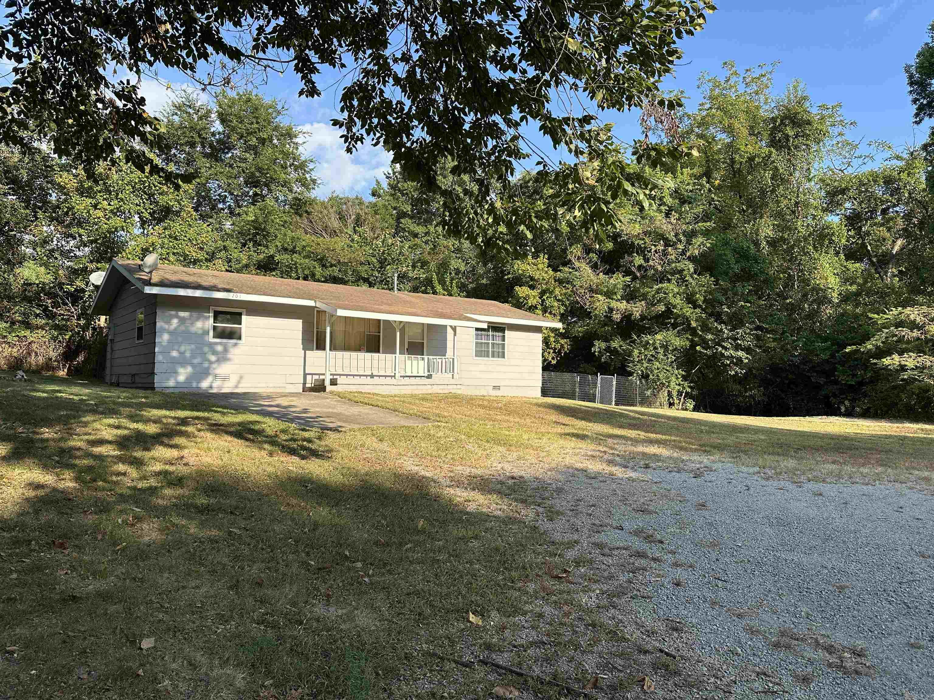 Tucked away at the end of a quiet road, this 3-bedroom, 1-bath home offers the convenience of in-town living with a peaceful, out-of-town feel. Step inside to find a well-kept interior featuring carpet and tile flooring throughout, making it both comfortable and easy to maintain. The all-electric home is spotless and move-in readyāperfect as a starter home or a low-maintenance retirement retreat. Outside, enjoy relaxing or entertaining on the nice back deck overlooking the fully fenced backyard, ideal for pets, gardening, or simply soaking in the privacy. A rare find with a great blend of town convenience and country charm!
