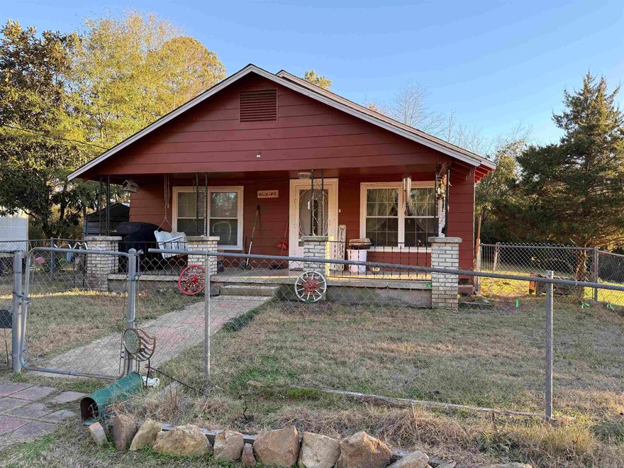 Precious older home with tons of updates! Roof, HVAC, windows less than 2 years old. Fresh paint in most rooms. Septic with upgraded lid pumped less than 3 years ago. New flooring, new receptacles including GFCIs in bathrooms. All new light fixtures, current termite and pest policy. Infrared lights in crawl space and heated and cooled shop! Lovely fenced area, corner lot with carport. Home has been highly rated for solar. Come see this cozy, well loved home and make it yours! Storm shelter! See agent remarks.