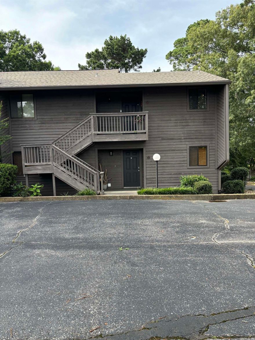 OWNER IS READY TO LET IT GO.  BRING ALL OFFERS !!!!!!  Welcome to your dream lake condo on Lake Hamilton.  This stunning 2 bedroom, 2 bath lake condo offers the perfect blend of comfort and luxury in a serene parklike setting.  Nestled in an idyllic location, this condo overlooks a sparling pool, providing a picturesque view right from your patio/balcony.  Step inside to find a spacious and inviting living space, featuring modern finishes and ample natural light.  The well-appointed kitchen boast top=of-the-line appliances purchased in 2021.  HVAC was installed in 2023.  Boat slip is rented until April, 2025. Storage under deck for all you water toys.  Experience the best of both worlds with this exceptional condo-a peaceful oasis with convenient amenities and recreational opportunities right at your doorstop.  Don't miss this chance to make this extraordinary property your new home.