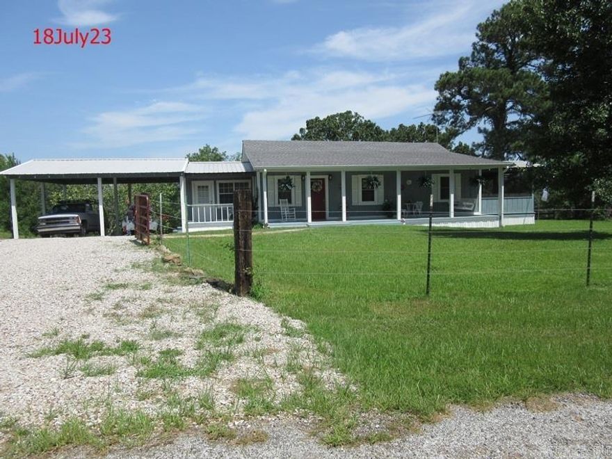 11.5 ACRES in BISMARCK... 2 BR 2 bath $263,000!! gorgeous curb appeal, cov'd parking with metal roof, full length front porch w/swing, immaculate interior with 2 screened back porches, most furnishings/decor convey; storage building, stocked pond and barn, totally fenced & iron gate from driveway to house; see deer almost every day from back porch, beautiful change of the seasons; if you love /appreciate country living with natural surroundings, deer & other creatures of nature, you will fall in love this this place
