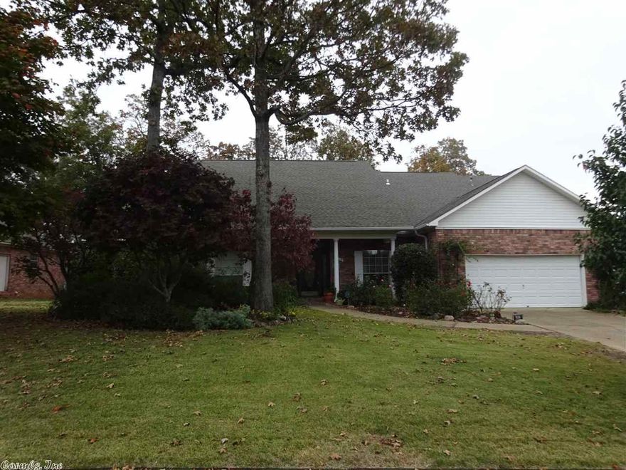 OUTSTANDING HOME - LAKE HAMILTON SCHOOLS & LAKE HAMILTON ACCESS!  This 3000 SF home is all one level, has an abundance of living areas, lots of light, and an excellent floor plan!  Interior offers hardwood floors, fireplace, granite, custom cabinetry.  All brick exterior has been lovingly landscaped w/perennials and there are porches, patio, pergola, raised beds and a 16 X 18 SHOP.  A must see!