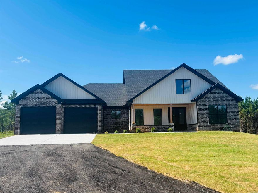 With expansive outdoor space, there's plenty of room to enjoy nature, create your dream garden, or build out additional structures. This 4 bedroom, 3 baths, Nestled on the hilltop of a 3.74 acre lot, this inviting ranch style home offers the perfect balance of comfort and country living. Features an open living space, large 2-car garage and plenty of storage is perfect for everyday living. Don't miss the chance to experience peace and privacy in this stunning setting!