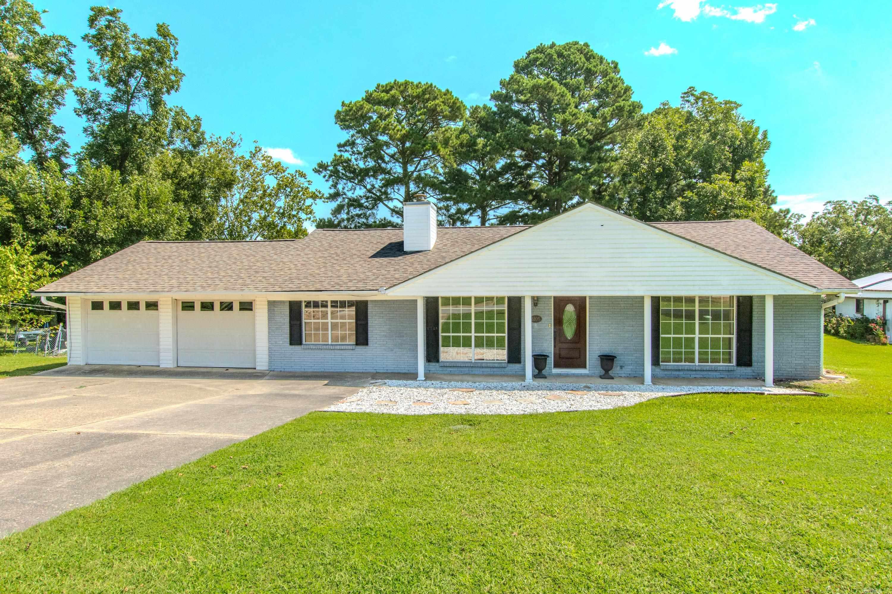 Here's a great opportunity to own a lovely waterfront property in Benton. This lovely 3 bedroom, 2 bath home features an expansive deck (1400 sq ft) that overlooks the lake in the Beautiful Lakeview subdivision. This home also boasts of two separate living areas. One of the living areas is a bright, spacious sunroom with a . The flooring has been updated in this home, and the roof was replaced in 2019. There is a 14 x 8 storage building that conveys. This property includes your own nice, private dock where you can sit and fish or simply relax and enjoy the water. Call today to schedule a personal tour!