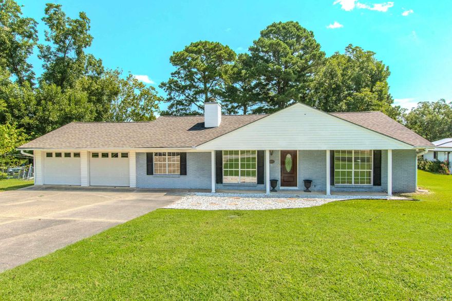Here's a great opportunity to own a lovely waterfront property in Benton.  This lovely 3 bedroom, 2 bath home features an expansive deck (1400 sq ft) that overlooks the lake in the Beautiful Lakeview subdivision.  This home also boasts of two separate living areas.  One of the living areas is a bright, spacious sunroom with a .  The flooring has been updated in this home, and the roof was replaced in 2019.  There is a 14 x 8 storage building that conveys.  This property includes your own nice, private dock where you can sit and fish or simply relax and enjoy the water.  Call today to schedule a personal tour!