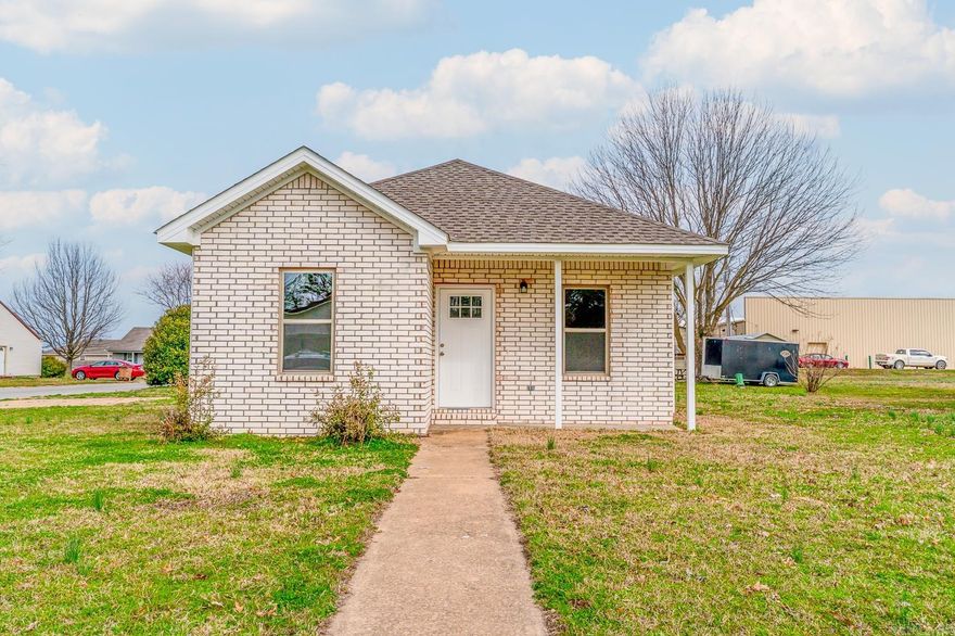Welcome to Market 306 Southfield Drive of Harrisburg, Arkansas within the North Acres Subdivision. This New Construction home is eligible for a Rural Development Loan with 0% down if you qualify.  Situated on a .18 +/- acre level lot is a 2023 build wrapped in brick & vinyl and topped with architectural shingles. The interior holds 987 sf of well laid out living space and holds three bedrooms, one full bath with shower/tub combo, open concept living/kitchen/dining area, and laundry room. You'll love the contemporary color palette and floor plan.  All electric, squeaky clean and move in ready! Conveniently located near Highway 1 and favorite local retail and dining establishments.  Call today to make this house your home or next addition to your rental portfolio.