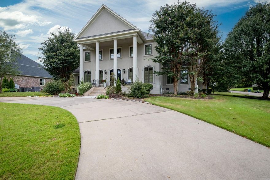 Renovated and ready! Over $300,000 in improvements and updates to this elegant yet versatile estate. Oversized .64 acre lot, circular drive, private backyard with firpelace, water feature, covered stone patio. Austin metal front door, plantation shutters throughout, hardwoods, new windows, 10' ceilings. Entertainers dream - dining, den, living, and kitchen all flow together naturally. Chef's kitchen complete with quartz counter tops, ice machine, vegetable sink, gas grill/griddle, sub zero refrigerator, prep pantry and expansive island. Cozy master suite has fireplace, sitting area, patio access, Kohler tub, marble shower, heated floors, his/her closets. Dual staircases - one for massive game room/media/kid hangout/office/craft, and the other for 3 BR & 3 BA (all ensuite) plus kid's study or play area. Mud room, central vac system, excess storage, landscape lighting (front & back), recirculating HWH. Quality abounds with custom finishes!