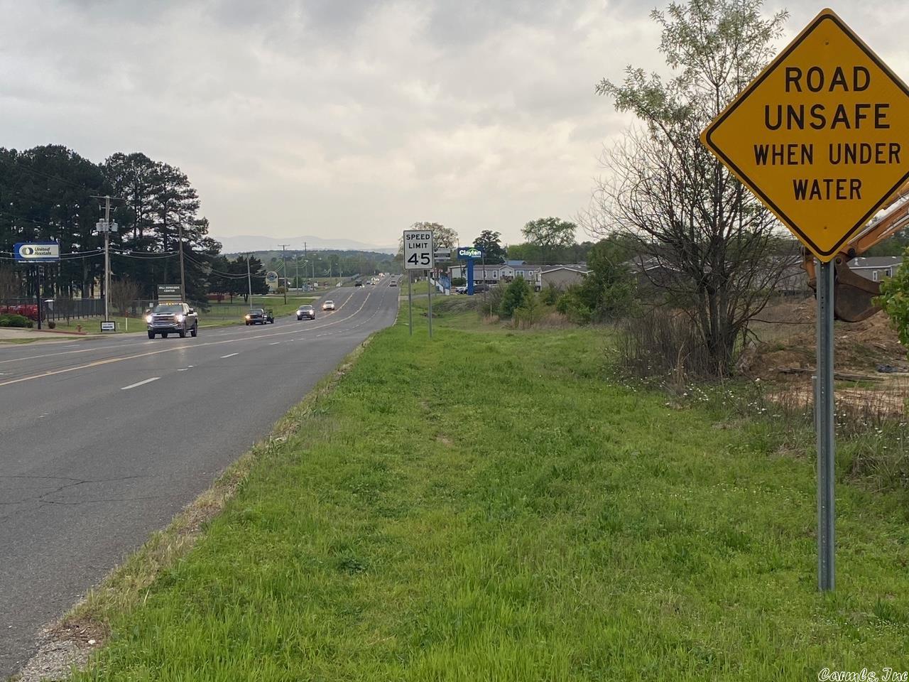 5.0 +/- ACRES OF COMMERCIAL PROPERTY located on Airport Road, near the Airport. Approximately 760'+/- HWY 70W frontage, 600'+/- Molly Springs Road, good ingress/egress. Highly visible, high traffic area, many business opportunities exist on this blank canvas piece of commercial property.