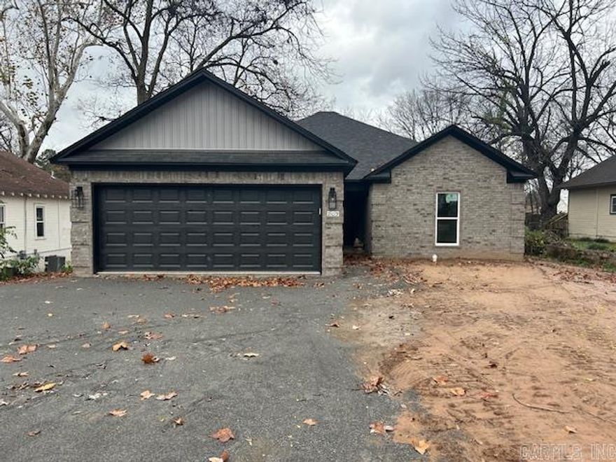New construction homes like this one don’t come up often in Morrilton! This quality-built brick beauty by Hobbs Construction offers timeless curb appeal with a two-car garage. Step inside to an open floor plan filled with modern touches, including sleek luxury vinyl plank flooring, quartz countertops in kitchen, and stainless steel appliances. Thoughtful built-ins throughout the home add both style and functional storage. Generous walk-in closets offer plenty of room to organize, and a large laundry room adds everyday convenience with extra cabinetry and space to work. Out back, a covered patio provides the perfect spot for relaxing or entertaining year-round. Conveniently located close to downtown Morrilton, this home puts shopping, dining, and local amenities within minutes. Don’t miss your chance to make this thoughtfully designed home yours!
