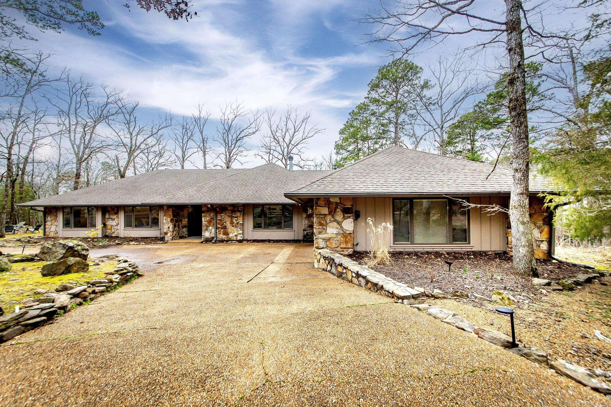 You will love this charming lakeview home in Eden Isle just minutes from Red Apple Inn and Greers Ferry Lake!! The floor plan encompasses 2 living areas with dual fireplaces, 3 roomy bedrooms, 3 1/2 bathrooms giving you 2,400sf of spacious elegance! The generously proportioned interior flows effortlessly from the open-plan living space to the rear deck and patio perfect for family gatherings! And to top it off, home is being sold furnished! Call today to schedule a private tour of this lovely home before it's gone!