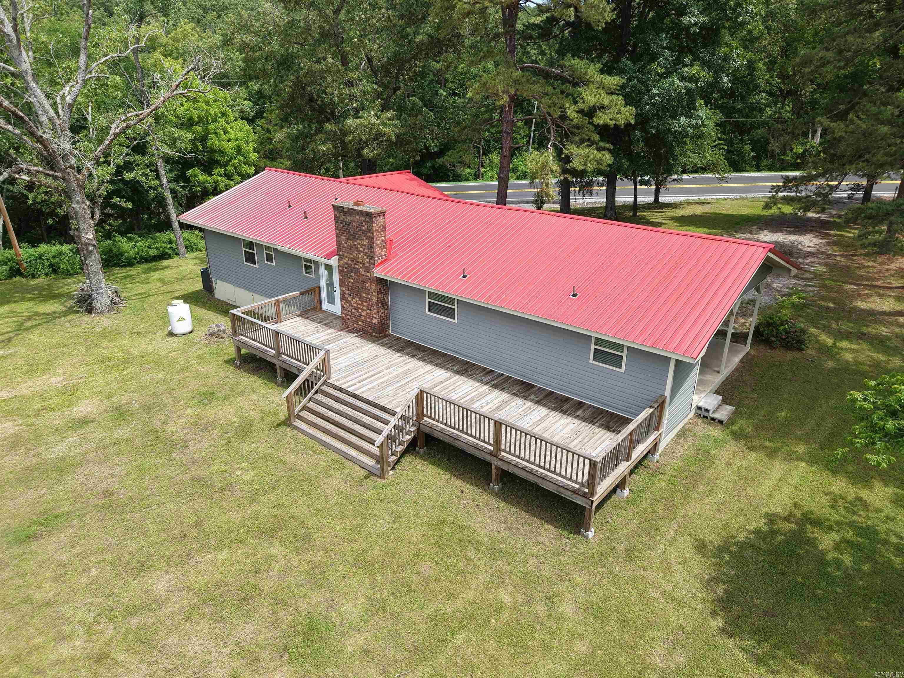 This 3-bedroom, 2-bathroom home is situated on 3 scenic acres, just north of Melbourne along Hwy 9. This property offers peaceful country living with the convenience of being only minutes from town amenities, schools, dining, and shopping. Step inside to find an open layout filled with natural light, thanks to large windows and a functional floor plan perfect for entertaining or relaxing. The kitchen boasts stylish new appliances, custom countertops, and a fresh, modern design. A spacious laundry room adds extra convenience. Each bedroom and bathroom has been thoughtfully updated with quality finishes, including beautiful new flooring and lighting throughout. Enjoy outdoor living on the brand-new deck ā ideal for morning coffee, summer barbecues, or simply soaking in the serene views. The 3-acre property provides plenty of room for gardening, recreation, or enjoying the natural surroundings. This move-in ready home is more than just a house ā itās a place to create lasting memories. Priced at just $219,900 ā donāt miss your chance to make it yours!
