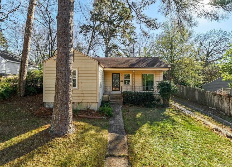 Charming bungalow in the highly desired Kingwood/Cammack area! This home features original hardwood floors throughout, an updated bathroom, and newer windows that allow for abundant natural light. Offering two living rooms and an eat-in kitchen, the layout provides flexibility and comfort for everyday living.  Enjoy the outdoors in the large, fully fenced backyard—perfect for entertaining—or relax on the front porch swing with your morning coffee. A detached shop adds extra storage or workspace.  Located in the sought-after Jefferson School District and close to Cammack Pool, Baker Park, and popular Heights restaurants and shops.  This charming property won’t last long—call today to schedule your private showing!