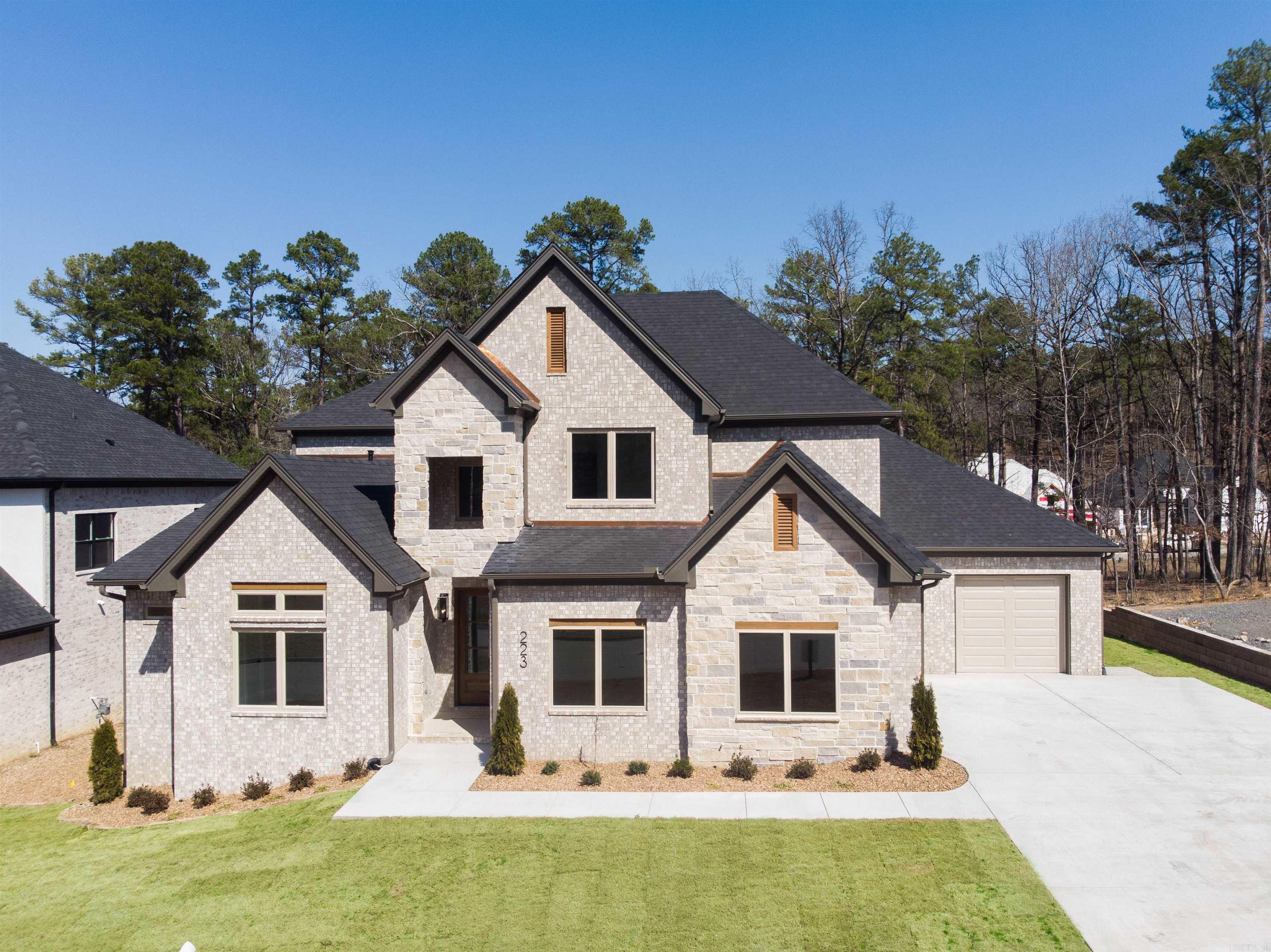 Discover luxury living at 223 Abington Circle, a 5-bed, 3.5-bath masterpiece built by Hines Homes in West Little Rock. Boasting 4,080 sq. ft., this home features a gourmet kitchen, versatile bonus rooms on both levels, and a spacious primary suite with a spa-like bathroom. Enjoy the convenience of a 3-car garage and covered back patio for outdoor entertaining. Located in a prime neighborhood with top-rated schools and amenities, this residence epitomizes upscale living. Schedule a self guided tour of this home on Hines Homes website!