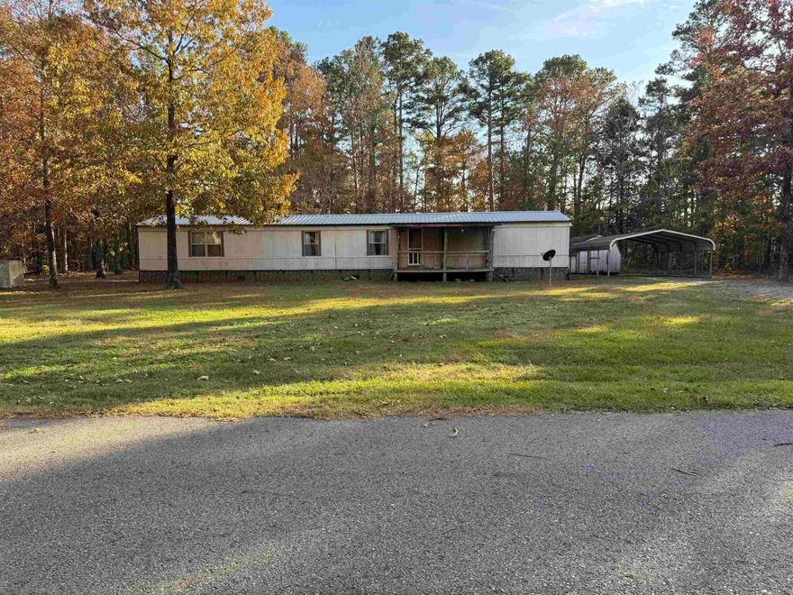 Newly remodeled mobile home on a little more than a half acre UNRESTRICTED lot. Inside features new wood trim and solid wood doors and cabinets. New kitchen appliances, all new vinyl plank flooring. Two-car carport and storage building stay. Washer and dryer stay. Close to Sugarloaf Marina. At the end of a dead-end road with lots of privacy and very little traffic. This would make a great full-time home, weekend home, or vacation rental. Make your appointment today to view in person.