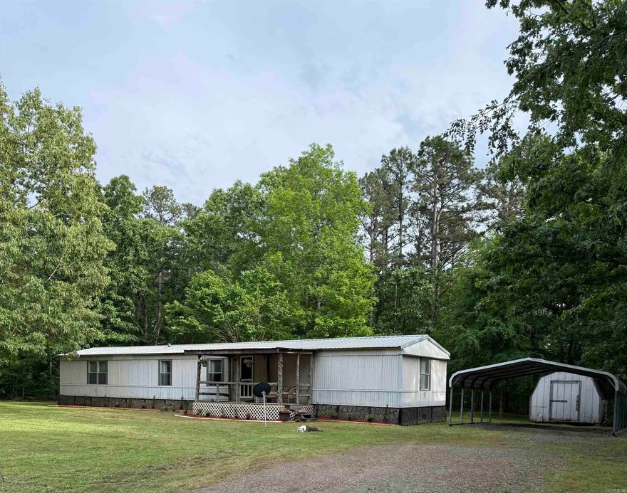 Newly remodeled mobile home on a little more than a half acre lot. Inside features new wood trim and solid wood doors and cabinets. First picture shows new landscaping added 04/30. New kitchen appliances, all new vinyl plank flooring. Two-car carport and storage building stay. Washer and dryer stay. Close to Sugarloaf Marina. At the end of a dead-end road with lots of privacy and very little traffic. This would make a great full-time home, weekend home, or vacation rental. Seller making improvements to qualify it for traditional financing. Make your appointment today to view in person.